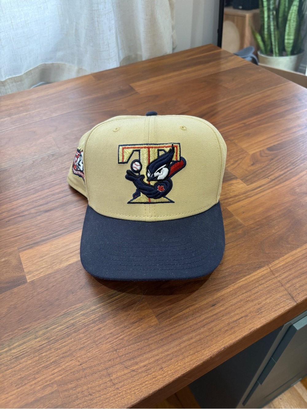 New Era Two-Tone Tan and Navy Cartoon Logo Baseball Cap